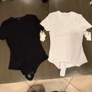 Good American TWO available Black and White Micro Tee Bodysuits
